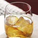A glass of Bulleit Bourbon on the rocks. Click to find our recipe for bourbon on the rocks